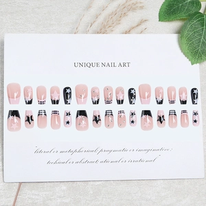 Classic French style trapezoid press-on nails with star patterns and sparkling rhinestones