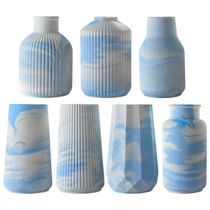 Blue and white marble texture resin vase molds in various geometric and striped styles