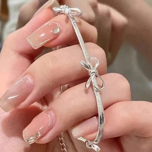 Silver bow knot snake chain bracelet with adjustable link for women stylish jewelry