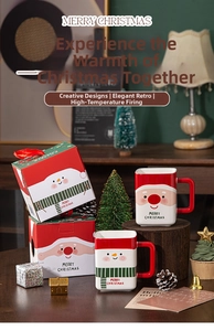 Close-up of Santa Claus ceramic mug set with festive holiday gift box and decor