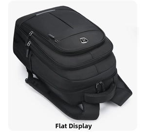 Detailed top view of a black business laptop backpack with multiple zipper compartments