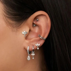 Silver marquise zircon dragonfly stud earrings and ear cuff set worn by model