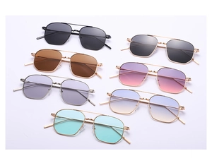 Detailed close-up showing seven stylish double-bridge metal sunglasses in assorted lens colors