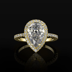 Classic gold pear-cut zircon halo engagement ring with pavé diamonds on black background