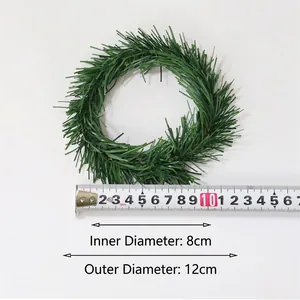 Detail of PVC pine needle wreath with 8cm inner and 12cm outer diameter specs