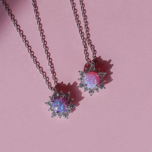 Silver necklace with purple and pink opal star pendants and micro-pave cubic zirconia