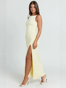 Elegant pale yellow slim fit maxi dress with halter neckline and high side slit