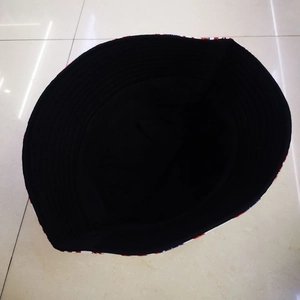 Reversible American flag bucket hat with wide brim and black interior for sun protection