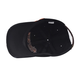 Detail view of 100% cotton baseball cap interior showing seams and moisture-wicking band