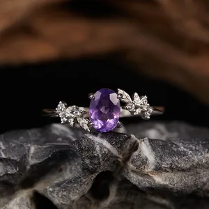Detailed macro view of S925 silver ring featuring natural amethyst and leaf design