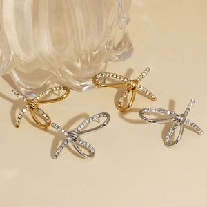 316L stainless steel bow knot stud earrings with zircon inlay in gold and silver finish