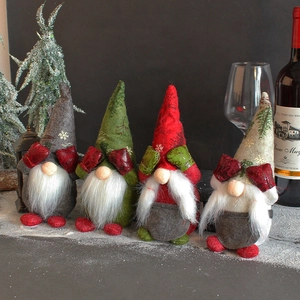 Plush Christmas gnomes set in grey green red and beige hats covering eyes with mittens
