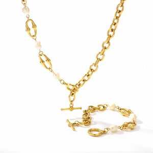 Asymmetric gold chain necklace and bracelet set with white freshwater pearls and OT clasp
