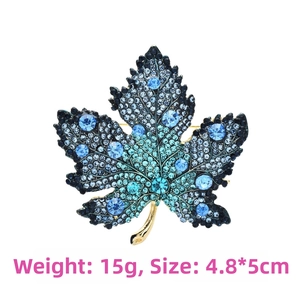 Detail of maple leaf brooch with blue gradient crystals, size 4.8x5cm and 15g weight