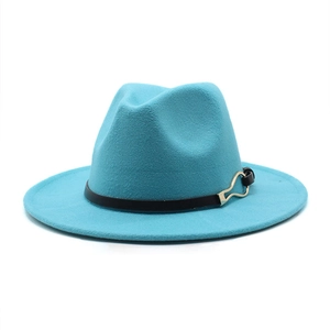 Detail of turquoise wool felt jazz hat featuring black leather band and gold horseshoe buckle