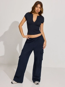 Slim fit V-neck button top with navy blue wide leg cargo pants in Y2K street style