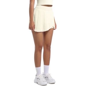 Detail of high-waisted pleated tennis skirt with irregular hem in off-white fabric