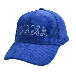 Detailed embroidery of white MAMA letters on a blue corduroy baseball cap texture