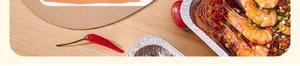 Food-grade aluminum foil tray with shrimp and glass noodles on a rustic wooden table