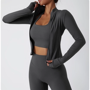 Detail of dark grey slim yoga set with stand collar zipper jacket and thumb hole sleeves