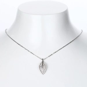 Detailed close-up of s925 sterling silver leaf pendant with sparkling pavé cubic zirconia