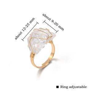 Detailed view of irregular citrine raw stone ring with gold wire wrapping and size info