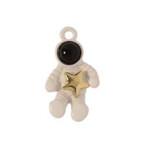 Detailed view of astronaut pendant charm with gold star and white enamel finish