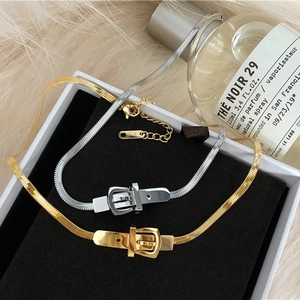 Minimalist gold and silver snake chain necklaces with belt buckle design and K18 tag