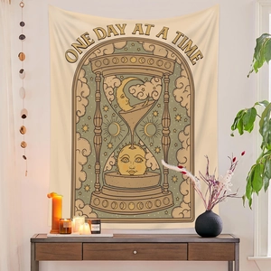 Detail of the sun and moon hourglass tapestry showing mystic celestial art and text