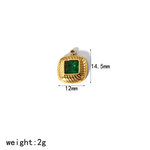 Macro detail of vintage gold square pendant with green gemstone and 14.5x12mm measurements