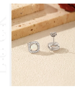 Detail of S925 silver cushion stud earrings featuring opal stones and white zircon accents