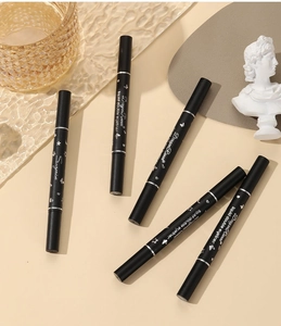 Flat lay of five double-ended liquid eyeliners with star and heart shape stamps