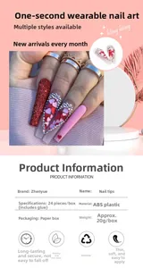 Macro shot of long ballet press-on nails with red glitter and heart rhinestone design