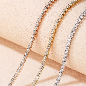 Three elegant adjustable stainless steel tennis bracelets with cubic zirconia stones in 3 colors