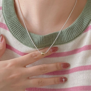 Elegant 925 sterling silver ball chain necklace with a gold cylindrical pendant