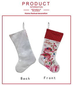 Front and back detail of Christmas stockings featuring flamingos and Merry Christmas text