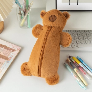 Close-up of fluffy brown bear plush pencil case featuring soft fur texture and zip closure