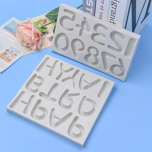 DIY silicone molds set for baking cake featuring numbers and capital letters in light grey