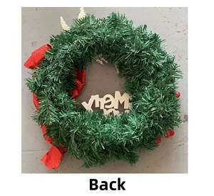 Detail view of the sturdy back structure of a green Christmas wreath with Merry sign