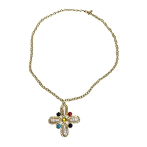 French vintage gold plated cross necklace with colorful gemstones and pearls on white background