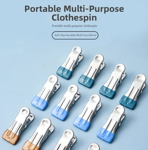 Detailed view of colorful stainless steel laundry pegs with non-slip rubber coated grips