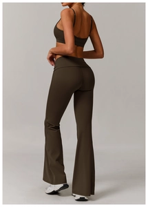 Detail view of high-waist flared yoga pants and sports top in deep mocha fabric