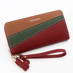 Three-color patchwork faux leather long wallet with wrist strap and tassel pendant