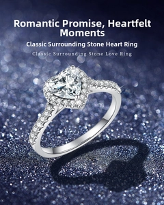 Close-up of heart-shaped moissanite ring with halo setting and pavé silver band