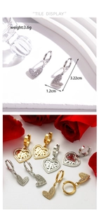 Detail showing dimensions and weight of tree of life heart drop earrings in gold and silver