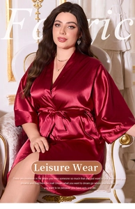 Macro shot of luxurious wine red satin fabric and waist tie on the lounge robe