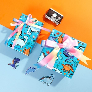 Cartoon dinosaur gift wrapping paper in sky blue with ROAR! text and colorful ribbons