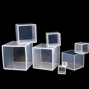 Macro detail of various sizes of square cube silicone molds for crystal resin art