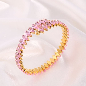 Titanium steel bracelet with pink marquise-cut zircons on a gold-plated base