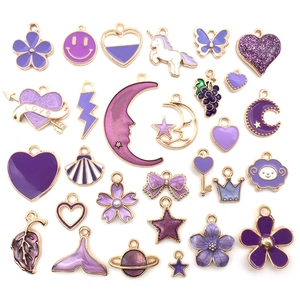 Purple enamel pendants in various shapes like heart and star for DIY jewelry making